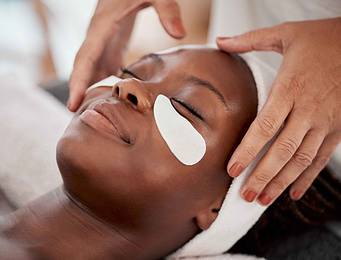 Woman receiving facial