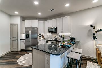 apartment kitchen with stainless steel appliances
