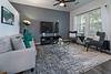 Modern living room with cozy furniture and stylish decor.