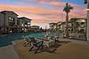 Poolside seating area with fire pit