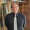 man wearing black shirt and gray tie