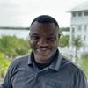 man smiling in polo shirt