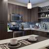 Kitchen with island and espresso cabinetry