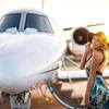 Woman next to plane