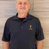 man wearing navy blue polo shirt