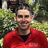 grinning man in polo shirt