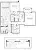 A floor plan of an apartment featuring two bedrooms, a balcony, and shared living spaces.