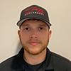 man wearing hat and black shirt