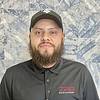 man with beard and baseball cap