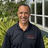 man wearing black polo shirt