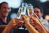people toasting champagne glasses