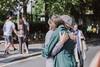 couple hugging on street