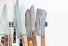 knives hanging on magnet strip