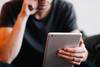 man holding tablet