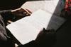 Person holding notepad