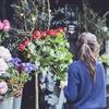 woman holding flowers