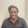 man wearing knit cap and black shirt