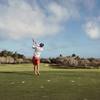Person golfing on course