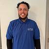 man with beard and blue shirt