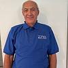 man wearing blue polo shirt