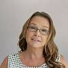 smiling woman with glasses