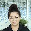 smiling woman with polo shirt