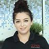 smiling woman with polo shirt