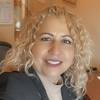 woman with curly blonde hair