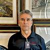 man wearing navy blue shirt