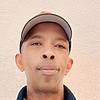 man wearing baseball cap