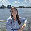 Smiling woman in front of St. Johns River
