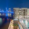 Swimming pool and apartment building with view of Downtown Jacksonville