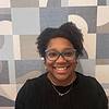 smiling woman wearing glasses