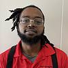 man wearing red shirt and black suspenders