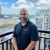 Bald Man with beard and polo shirt
