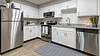 Apartment kitchen with stainless steel appliances
