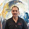man wearing black polo shirt