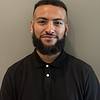 bearded man wearing black shirt