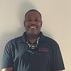 man wearing black polo shirt