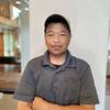 man wearing gray polo shirt