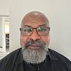 bearded man wearing glasses