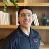 smiling man wearing glasses
