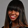 smiling woman with straight hair and bangs