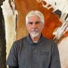 man with goatee and polo shirt