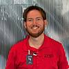 bearded man wearing red shirt