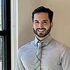 man with short beard and tie