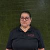 woman wearing shirt with nametag