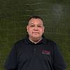 man wearing black polo shirt