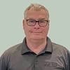 man with short hair and glasses