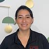 smiling woman in polo shirt